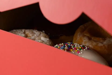 Opening A Box Of Donuts Stock Photos