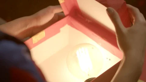 Opening a box with a magic gift Stock Footage 77828302