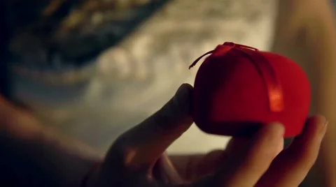 The opening of the box with a wedding ring Stock-Footage 68784559