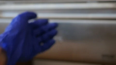 Opening a bread box and taking moldy bread Stock Footage 115834931