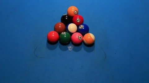 Opening break shot of balls on a blue pool table Stock Footage 83201548