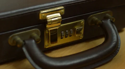 Opening briefcase Stock Footage 32426847