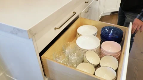 Opening A Cabinet For Bowls Video stock 147990142