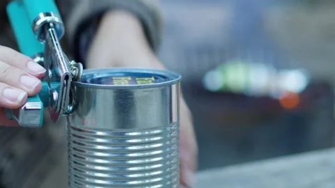 Opening Can By Campfire 4k Stock Footage 79667360