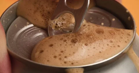 Opening Can with Foam Stock Footage 232819807