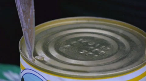 Opening the can in forest 動画素材 7758997