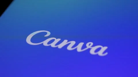 Opening Canva app on smartphone to create design, digital artwork, or edit Stock Footage 295169221