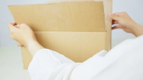 Opening Cardboard Package Box From Side View Video stock 347178866