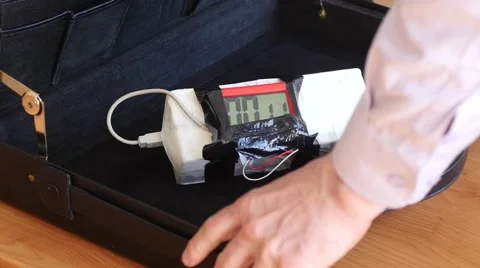 Opening the case with countdown timer linked with homemade bomb Stock Footage 49592553