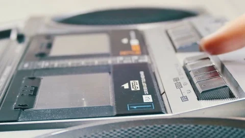 Opening the Cassette Deck, Inserting a Cassette and Playing a Tape Recorder Stock Footage 74922650