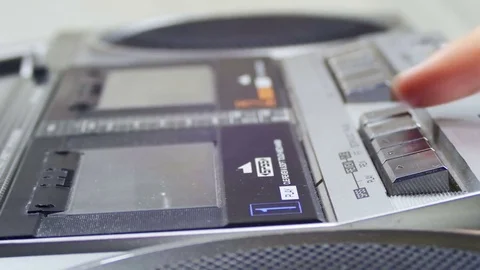 Opening the Cassette Deck, Inserting a Cassette and Playing a Tape Recorder Stock Footage 74925224