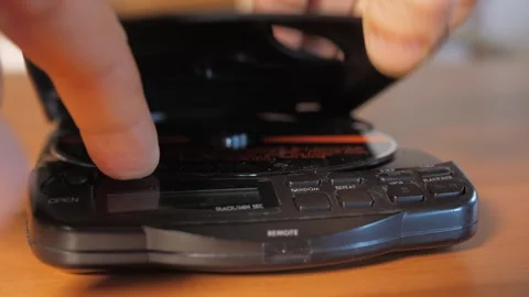 Opening cd player and removing cd 4k Stock Footage 289144173