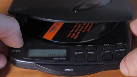 Opening cd player and removing cd 4k Stock-Footage 289144430