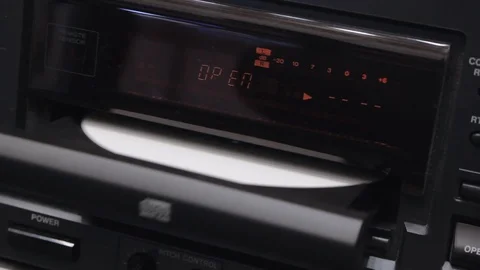 Opening a cd tray and taking out a blank white disk Stock Footage 108543181