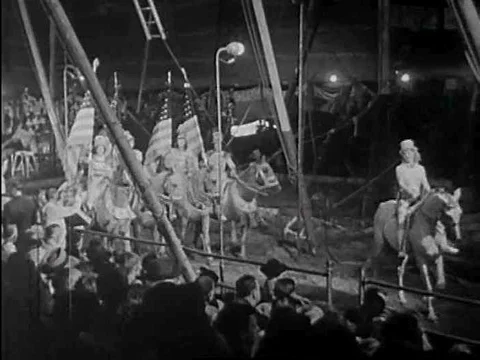 Opening ceremony of a circus under the big tent in 1942 with a variety ofƒ Stock Footage 75288359