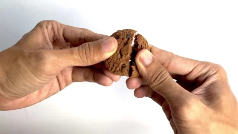 Opening a Chocolate Cookie Video stock 308639509