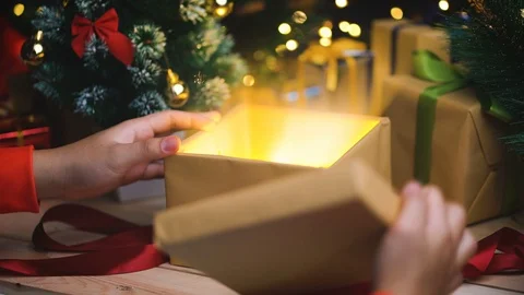 Opening Christmas Gift Light Shining Stock Footage 97048593