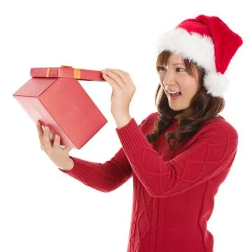 Opening christmas gift Stock Photos