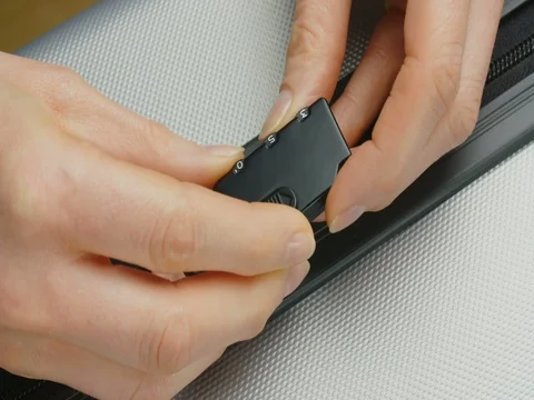 Opening Code Padlock on Suitcase Stock Footage 70341201