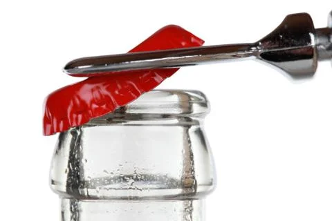 Opening a cola bottle Foto stock