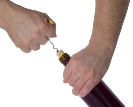 Opening a corkscrew bottle of wine Stock Photos