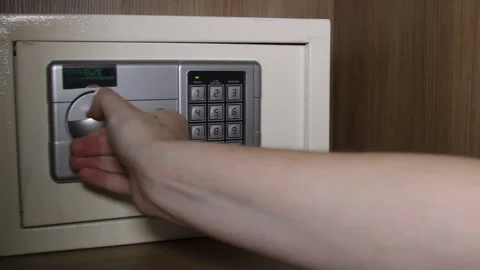 Opening a Digital Safe Box located inside the Closet. Stock Footage 148793439