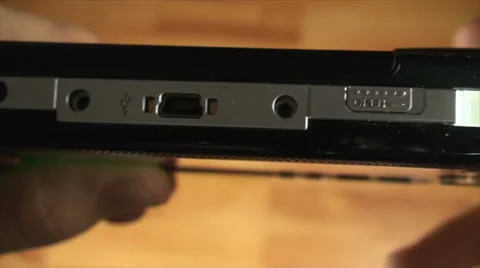 Opening The Disk Tray From A Portable Gaming Console, Close Up Stock Footage 39350863