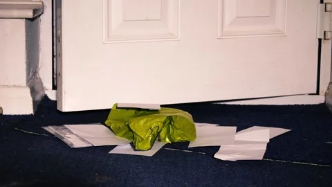 Opening door to letters and parcels delivered pile up in home behind door Stock Footage 256921953