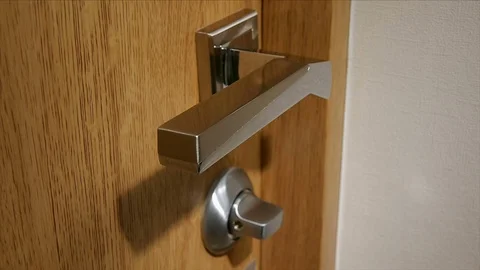 Opening the door, lock the rotation Stock Footage 71330970