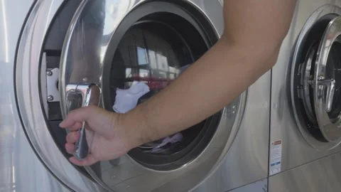 Opening The Door From The Washer Stock Footage 310280292