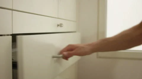 Opening drawer and shuffling through folders Stock Footage 41385183