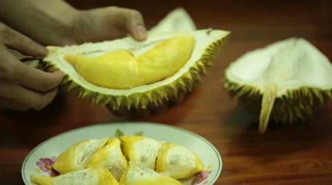 Opening a durian fruit. Stock Footage 55710201