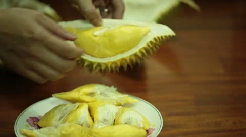 Opening a durian fruit. Stock Footage 55710217