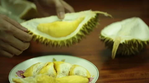 Opening a durian fruit. Stock Footage 55710218