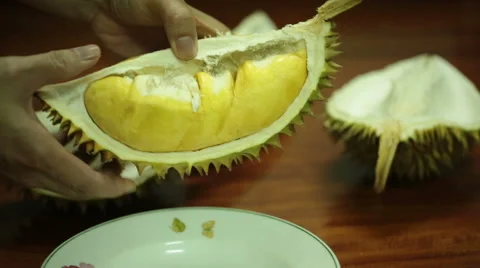 Opening a durian fruit. Stock Footage 55710227