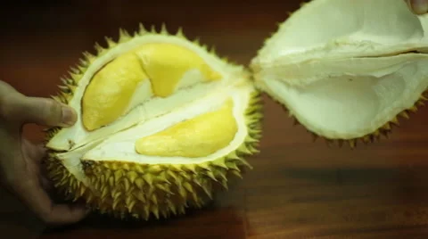 Opening a durian fruit. Stock Footage 55710237