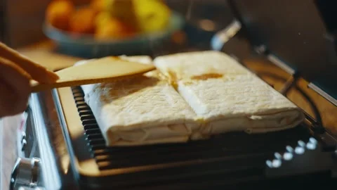 Opening the electric grill and checking the readiness of homemade shawarma. Stock Footage 237445335