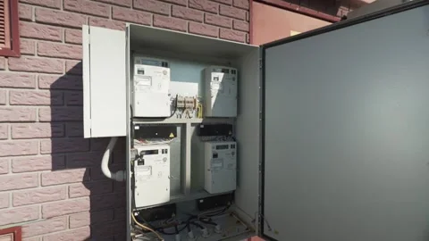 Opening the electric meter cabinet. Stock Footage 167250804