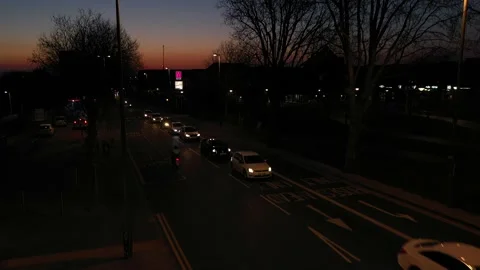 OPENING ELEVATION AERIAL OF CITY HIGH ROAD OF BUSY TRAFFIC AT SUNSET Video stock 150005040