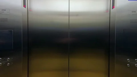 Opening elevator doors in a modern office building Stock Footage 151037999
