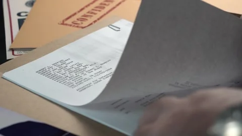 Opening FBI Case File Folder With OJ Simpson Trial Documents, Photo and Stock Footage 324386292