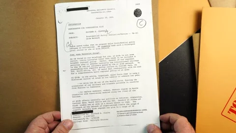 Opening FBI File Case Folder With Memorandum About Al-Qaeda Network Before 9 11 Video stock 324050401