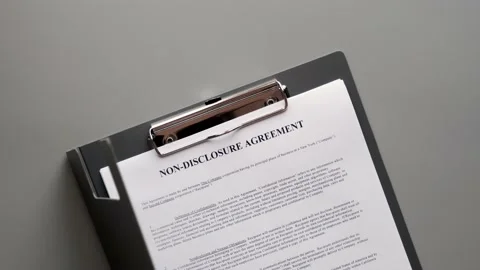 Opening folder with NDA document. Non-disclosure agreement. 4K footage Stock Footage 181374216