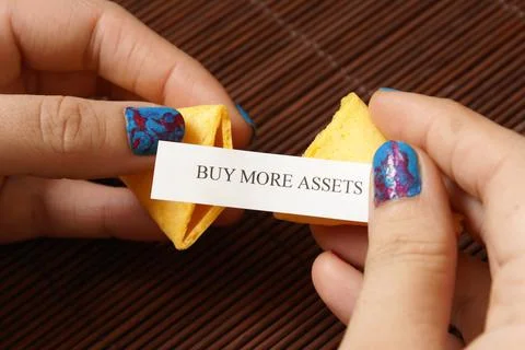 Opening A Fortune Cookie Stock Photos