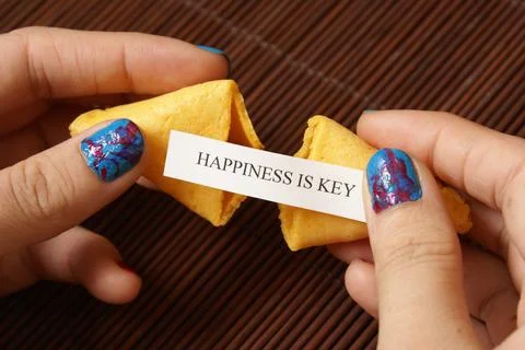 Opening A Fortune Cookie Stock Photos