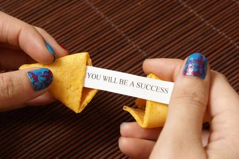 Opening A Fortune Cookie Stock Photos