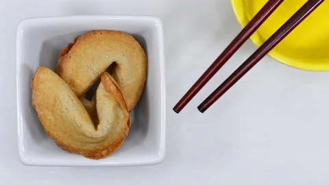 Opening fortune cookies Stock Footage 98682471