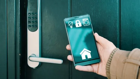 Opening front door lock with smart home app on mobile phone Video stock 102158837