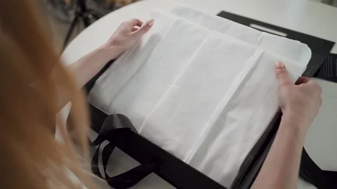 Opening a gift or surprise. Stock Footage 146661321