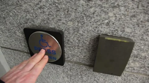 Opening a handicap automatic door. Stock Footage 41451435